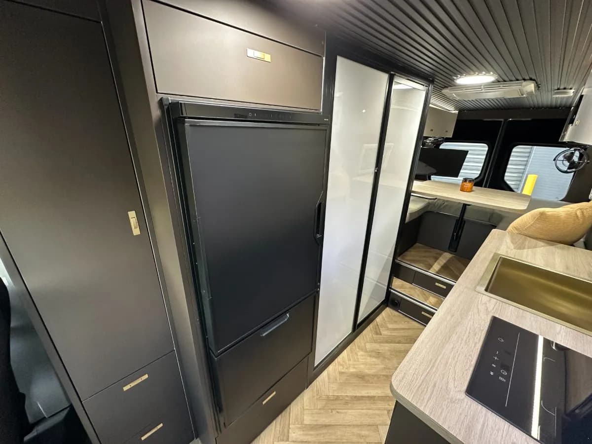 Strada cabinetry, compressor fridge and wardrobe